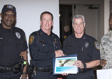 San Antonio Police Department presents certificate of appreciation to 502nd Security Forces Squadron