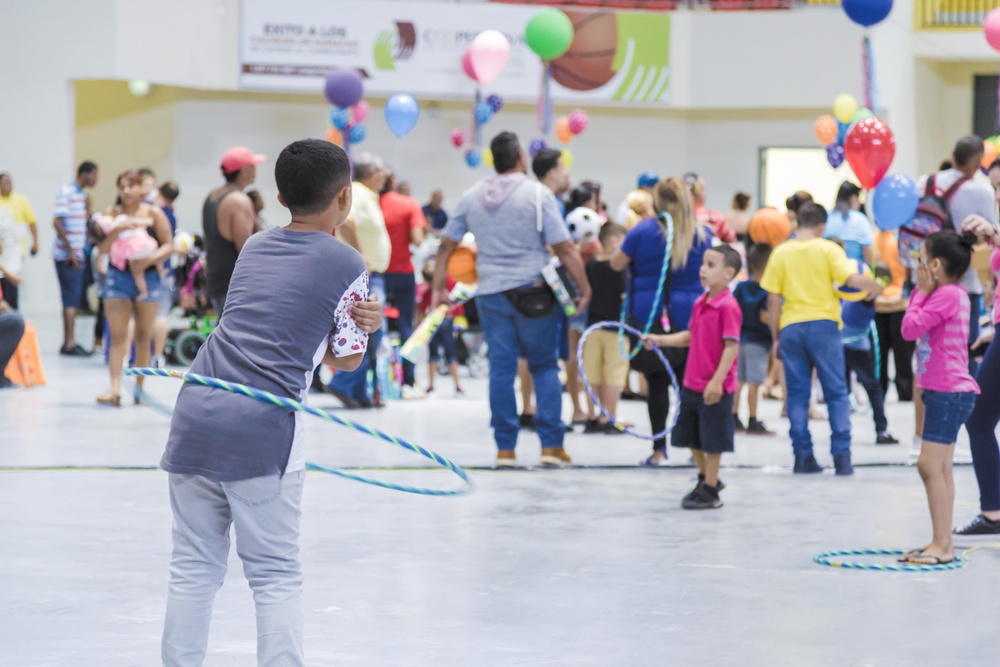 Boy Dancing The Hula Hoop During Three King's Celebration