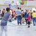 Boy Dancing The Hula Hoop During Three King's Celebration