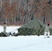 Cold-Weather Operations Course Class 18-02 students build Arctic tents during training at Fort McCoy