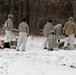 Cold-Weather Operations Course Class 18-02 students build Arctic tents during training at Fort McCoy