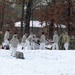 Cold-Weather Operations Course Class 18-02 students build Arctic tents during training at Fort McCoy