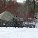 Cold-Weather Operations Course Class 18-02 students build Arctic tents during training at Fort McCoy