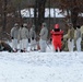 Cold-Weather Operations Course Class 18-02 students build Arctic tents during training at Fort McCoy