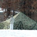 Cold-Weather Operations Course Class 18-02 students build Arctic tents during training at Fort McCoy