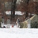 Cold-Weather Operations Course Class 18-02 students build Arctic tents during training at Fort McCoy