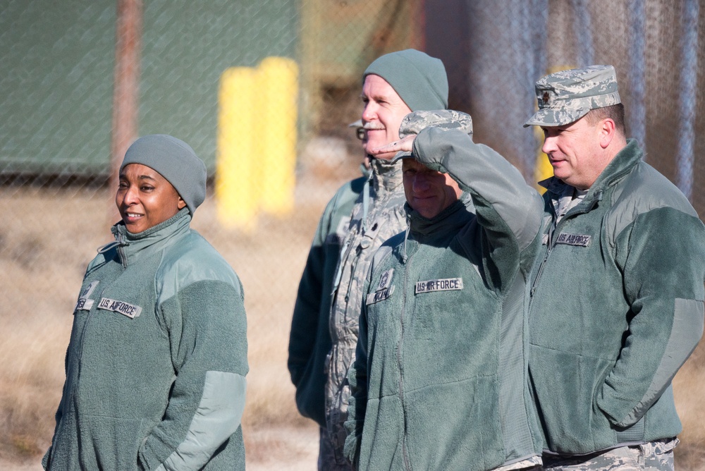 Members of the 102nd Intelligence Wing watch Fini-Flight