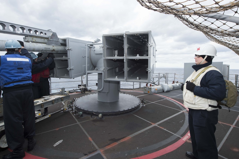 USS Bonhomme Richard (LHD 6) Fire Controlman load NATO Sea Sparrow missiles