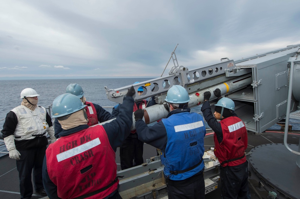 USS Bonhomme Richard (LHD 6) Fire Controlman load NATO Sea Sparrow missiles