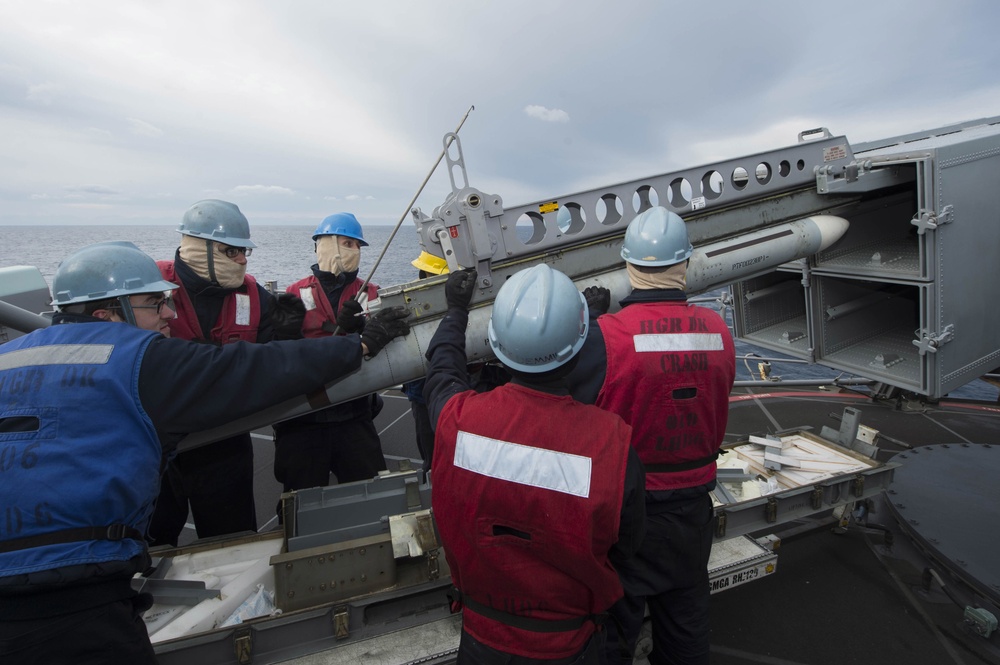 USS Bonhomme Richard (LHD 6) Fire Controlman load NATO Sea Sparrow missiles