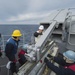 USS Bonhomme Richard (LHD 6) Fire Controlman load NATO Sea Sparrow missiles