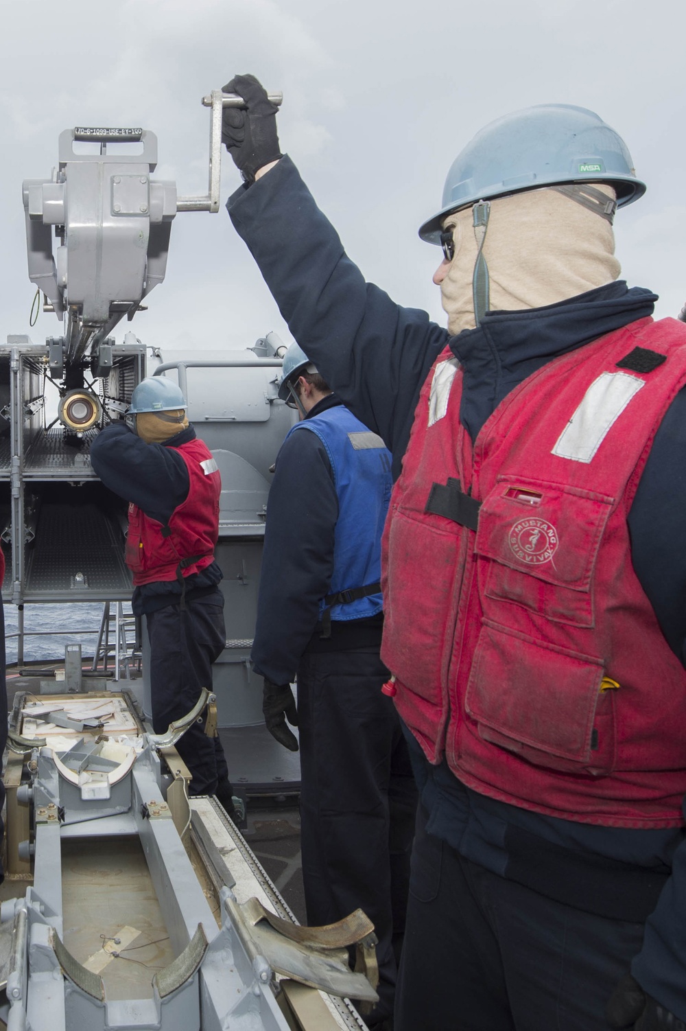 USS Bonhomme Richard (LHD 6) Fire Controlman load NATO Sea Sparrow missiles