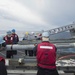 USS Bonhomme Richard (LHD 6) Fire Controlman load NATO Sea Sparrow missiles