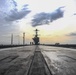 Stennis Sailors walk the deck