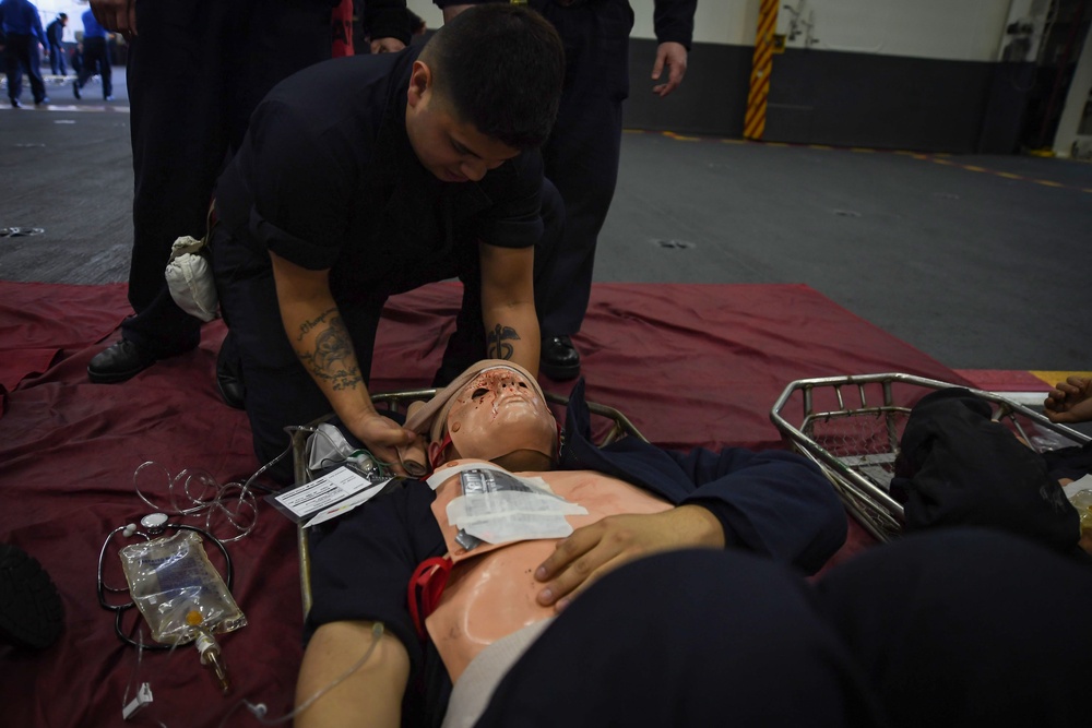 Stennis Sailors perform mass casualty drill.