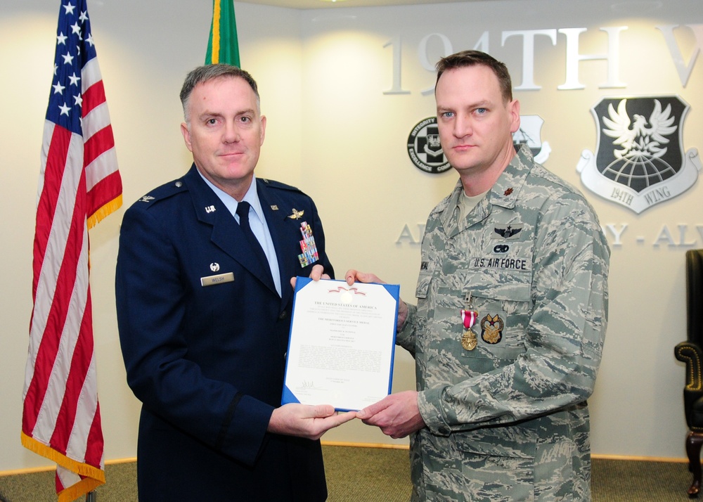 Manewal receives Meritorious Service Medal