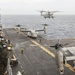 USS America Sailorconducts a presentaion during tiger cruise