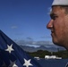 USS San Diego (LPD 22) Airman Prepares to Conduct Colors