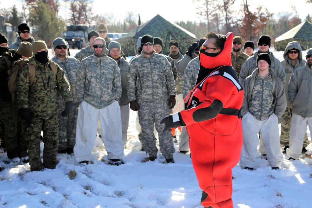 Service members battle icy conditions in cold-water immersion training at Fort McCoy