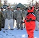Service members battle icy conditions in cold-water immersion training at Fort McCoy