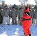 Service members battle icy conditions in cold-water immersion training at Fort McCoy