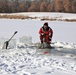 Service members battle icy conditions in cold-water immersion training at Fort McCoy