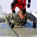 Service members battle icy conditions in cold-water immersion training at Fort McCoy