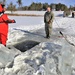 Service members battle icy conditions in cold-water immersion training at Fort McCoy