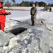 Service members battle icy conditions in cold-water immersion training at Fort McCoy