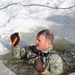 Service members battle icy conditions in cold-water immersion training at Fort McCoy