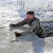 Service members battle icy conditions in cold-water immersion training at Fort McCoy