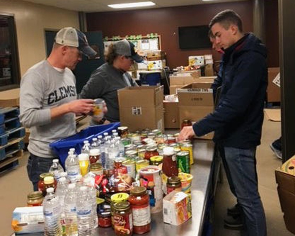 561st NOS assists with 1,000 food boxes for local food banks, homeless