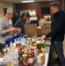 561st NOS assists with 1,000 food boxes for local food banks, homeless