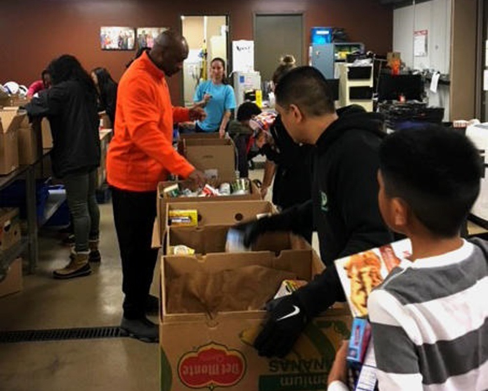 561st NOS assists with 1,000 food boxes for local food banks, homeless