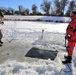 Service members battle icy conditions in cold-water immersion training at Fort McCoy