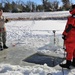 Service members battle icy conditions in cold-water immersion training at Fort McCoy