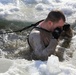 Service members battle icy conditions in cold-water immersion training at Fort McCoy