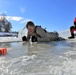 Service members battle icy conditions in cold-water immersion training at Fort McCoy