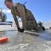 Service members battle icy conditions in cold-water immersion training at Fort McCoy