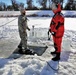 Service members battle icy conditions in cold-water immersion training at Fort McCoy