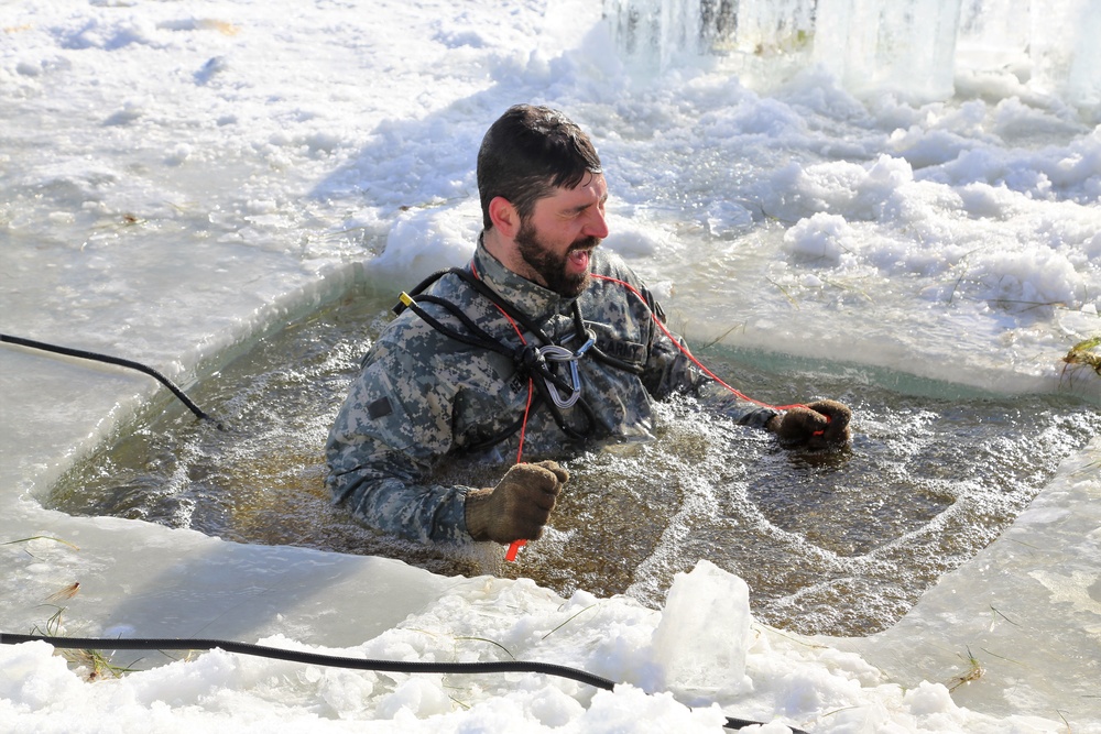 Service members battle icy conditions in cold-water immersion training at Fort McCoy