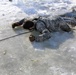 Service members battle icy conditions in cold-water immersion training at Fort McCoy