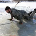 Service members battle icy conditions in cold-water immersion training at Fort McCoy