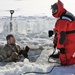 Service members battle icy conditions in cold-water immersion training at Fort McCoy