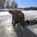 Service members battle icy conditions in cold-water immersion training at Fort McCoy