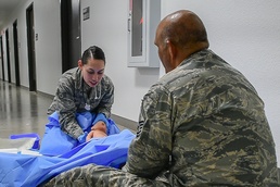 Airmen participate in Emergency Medical Technician refresher training