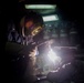 Sailor welds a bracket