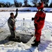 Cold-Weather Operations Course students battle icy conditions in cold-water immersion training at Fort McCoy