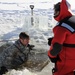 Cold-Weather Operations Course students battle icy conditions in cold-water immersion training at Fort McCoy