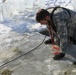 Cold-Weather Operations Course students battle icy conditions in cold-water immersion training at Fort McCoy